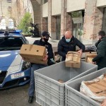 Capi di abbigliamento contraffatti, sequestrati dalla Polizia, donati al Sermig